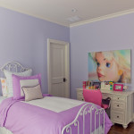In this shot of the children’s bedroom, you can see the specialty trim work and wood flooring.